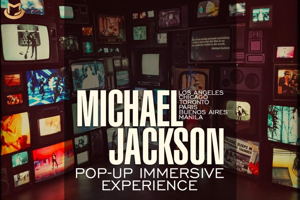 Una imagen de la experiencia pop-up de Michael Jackson, mostrando pantallas gigantes con clips de sus videos musicales.